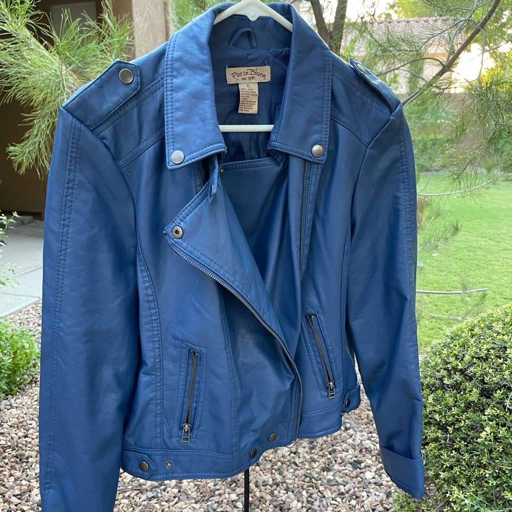 Jacket. New without tags. Never worn. Leather-like